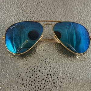 Ray-Ban Aviator Sunglasses with Gold Frame and Blue Lenses